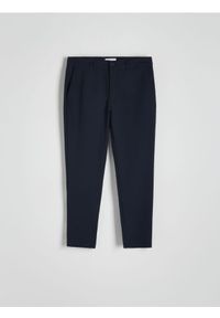 Reserved - Spodnie chino slim fit - granatowy. Kolor: niebieski. Materiał: tkanina, wiskoza #1