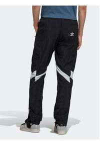 Adidas - adidas Spodnie dresowe Rekive HK7325 Czarny Regular Fit. Kolor: czarny. Materiał: syntetyk, dresówka #6