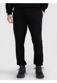 4f - 4F Spodnie dresowe joggery uniseks - czarne XS. Kolor: czarny. Materiał: dresówka. Wzór: ze splotem, gładki #2
