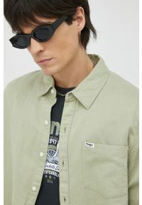 Wrangler koszula lniana kolor zielony relaxed z kołnierzykiem klasycznym. Typ kołnierza: kołnierzyk klasyczny. Kolor: zielony. Materiał: len. Długość: długie. Styl: klasyczny #3