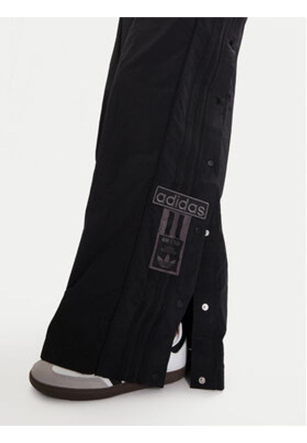 Adidas - adidas Spodnie dresowe Adibreak adicolor Adilenium JV7486 Czarny Oversize. Kolor: czarny. Materiał: syntetyk
