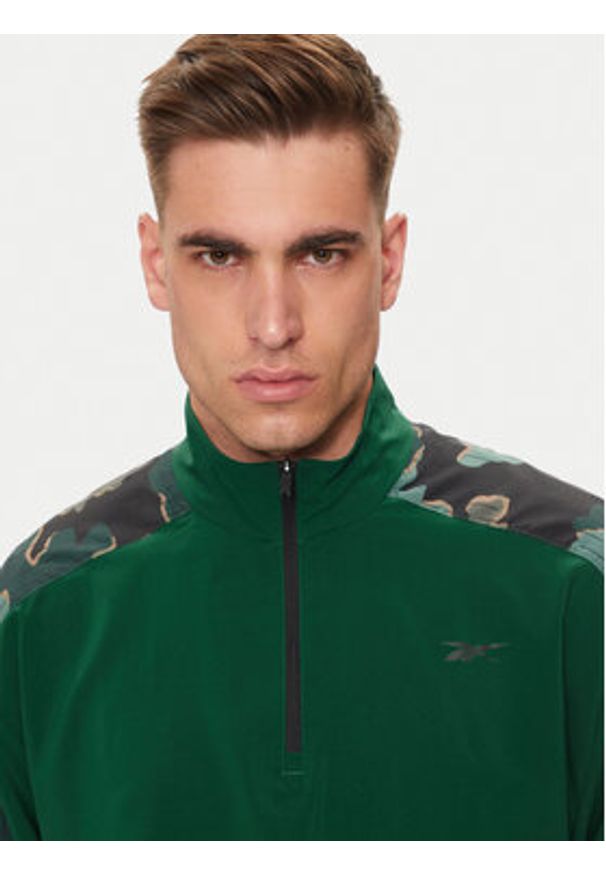 Reebok Bluza Train Motion 100075353 Zielony Relaxed Fit. Kolor: zielony. Materiał: syntetyk