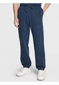 Champion Spodnie dresowe 217896 Granatowy Regular Fit. Kolor: niebieski. Materiał: dresówka, bawełna #1