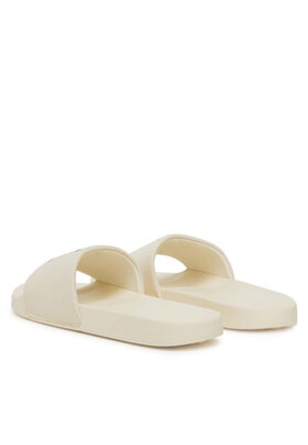 Calvin Klein Jeans Japonki Slide Monogram Wn Logo Ck YW0YW01967 Beżowy. Kolor: beżowy. Materiał: materiał