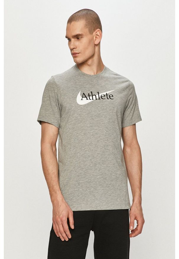 Nike - T-shirt. Okazja: na co dzień. Kolor: szary. Materiał: tkanina, dzianina, skóra, włókno. Wzór: nadruk. Styl: casual