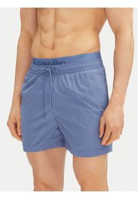 Calvin Klein Swimwear Szorty kąpielowe KM0KM01104 Niebieski Regular Fit. Kolor: niebieski. Materiał: syntetyk