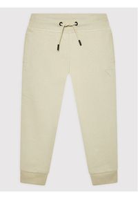Guess Spodnie dresowe L2YQ46 KAIJ1 Beżowy Regular Fit. Kolor: beżowy. Materiał: bawełna