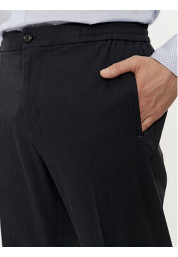 TOMMY HILFIGER - Tommy Hilfiger Chinosy Chelsea MW0MW33933 Granatowy Slim Fit. Kolor: niebieski. Materiał: bawełna