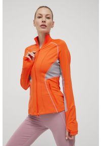 Adidas by Stella McCartney - adidas by Stella McCartney bluza treningowa Truepurpose damska kolor pomarańczowy wzorzysta. Okazja: na plażę. Kolor: pomarańczowy. Materiał: materiał, skóra, dzianina. Długość rękawa: raglanowy rękaw. Wzór: ze splotem, ażurowy