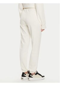 Guess Spodnie dresowe V5RB13 KC3D2 Écru Regular Fit. Materiał: bawełna, syntetyk