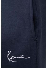 Karl Kani spodnie męskie kolor granatowy gładkie. Kolor: niebieski. Materiał: dzianina. Wzór: gładki #3