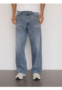 Reserved - Jeansy loose z efektem sprania - granatowy. Kolor: niebieski #1