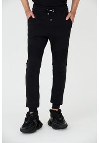 Balmain - BALMAIN Czarne spodnie dresowe RIbbed Flock Sweatpants. Kolor: czarny. Materiał: dresówka