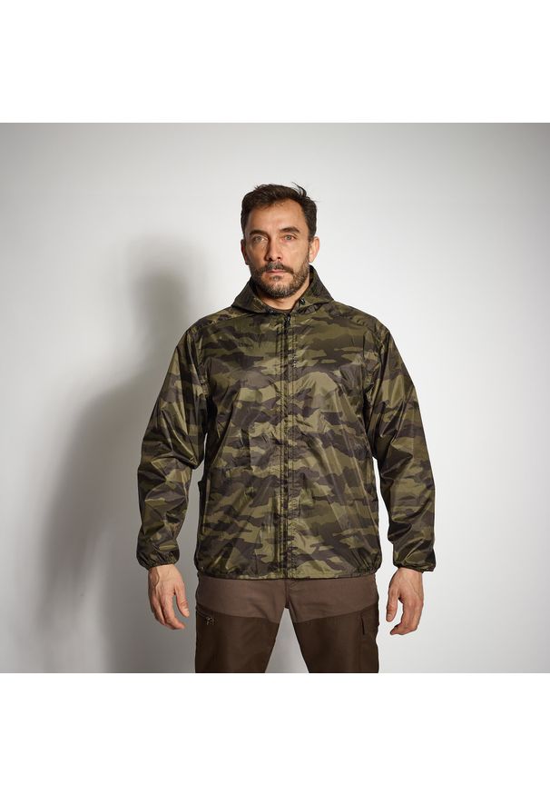 SOLOGNAC - Kurtka myśliwska wodoodporna lekka Solognac 100 camo. Kolor: brązowy, zielony. Materiał: poliester, materiał. Długość: krótkie. Sport: outdoor