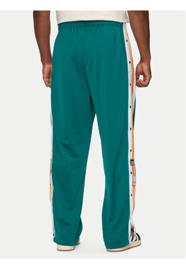 Adidas - adidas Spodnie dresowe Adibreak IY9932 Turkusowy Loose Fit. Kolor: turkusowy. Materiał: syntetyk