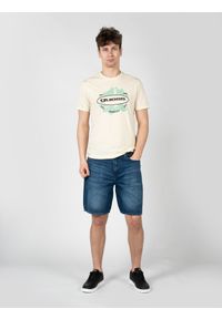 Guess T-Shirt "LA Logo" | M3GI61K9RM1 | Mężczyzna | Żółty. Okazja: na co dzień. Kolor: żółty. Materiał: bawełna. Długość: długie. Wzór: nadruk. Styl: elegancki, casual