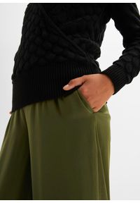 bonprix - Sweter ażurowy w optyce kopertowego. Kolor: czarny. Wzór: ażurowy #3