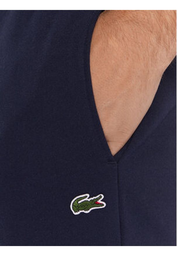 Lacoste Spodnie dresowe XH9610 Granatowy Regular Fit. Kolor: niebieski. Materiał: bawełna