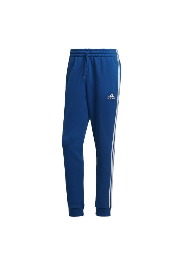 Adidas - Essentials Fleece Tapered Cuff 3-Stripes Pants. Kolor: biały, wielokolorowy, niebieski. Materiał: polar