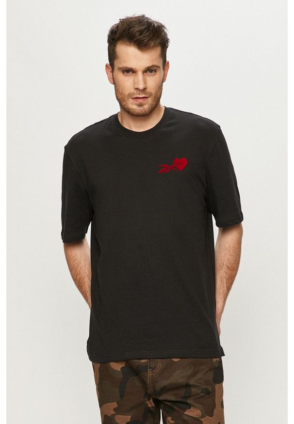 Reebok Classic - T-shirt. Okazja: na co dzień. Kolor: czarny. Materiał: dzianina. Wzór: nadruk. Styl: casual