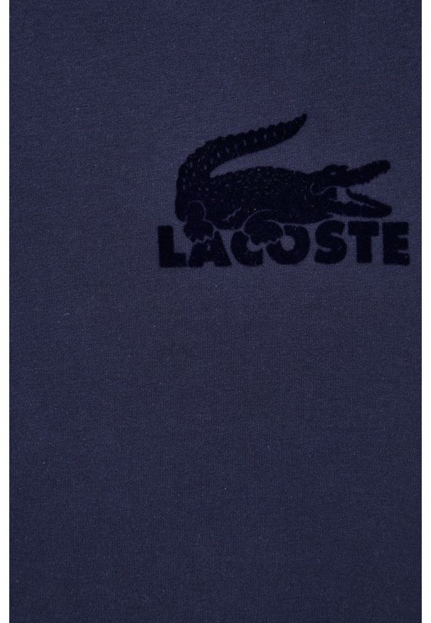 Lacoste bluza męska kolor granatowy z aplikacją. Okazja: na co dzień. Kolor: niebieski. Materiał: dzianina. Wzór: aplikacja. Styl: casual