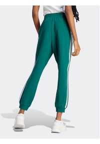 Adidas - adidas Spodnie dresowe Essentials 3-Stripes French Terry Loose-Fit Joggers IL3448 Zielony Loose Fit. Kolor: zielony. Materiał: bawełna #4