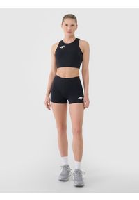 4f - 4F Legginsy krótkie treningowe damskie - czarne XL. Kolor: czarny. Materiał: dzianina, włókno, syntetyk, materiał, elastan. Długość: krótkie. Wzór: gładki, ze splotem, jednolity. Sport: fitness