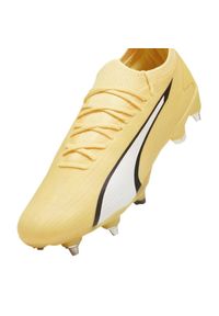 Buty piłkarskie Puma Ultra Ultimate MxSG M 107504 04 żółte. Kolor: żółty. Materiał: materiał. Szerokość cholewki: normalna. Sport: piłka nożna