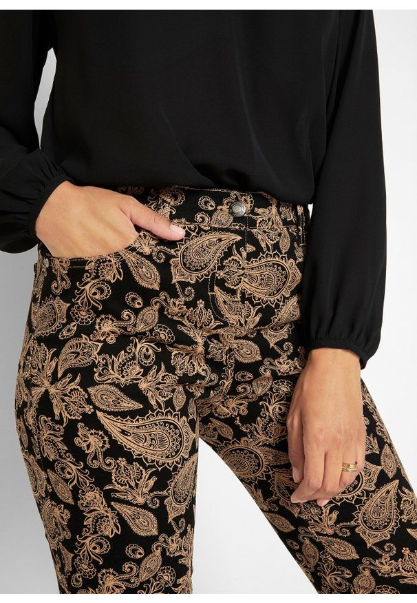 bonprix - Spodnie ze stretchem i nadrukiem. Kolor: czarny. Wzór: nadruk