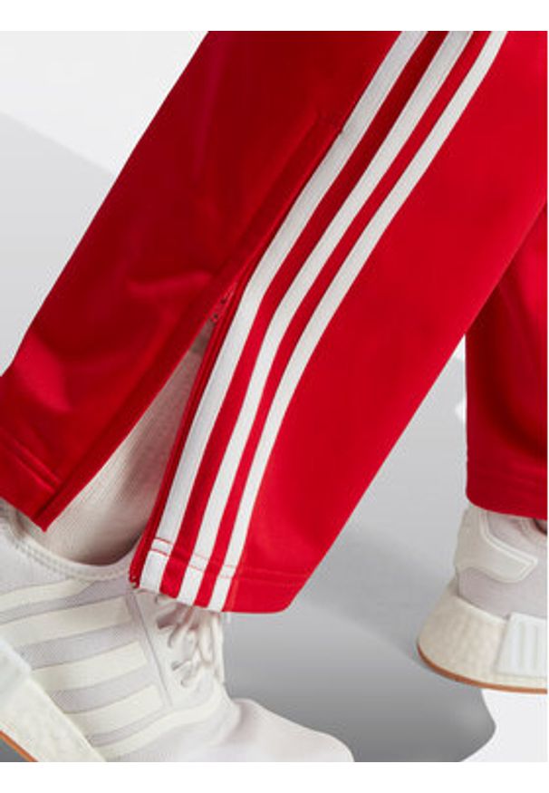 Adidas - adidas Spodnie dresowe adicolor Classics Firebird IJ7057 Czerwony Regular Fit. Kolor: czerwony. Materiał: syntetyk