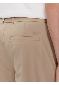 Calvin Klein Szorty materiałowe K10K112836 Beżowy Straight Fit. Kolor: beżowy. Materiał: syntetyk