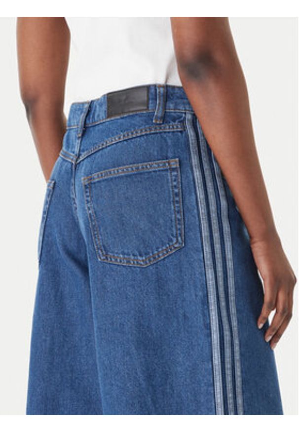 Adidas - adidas Jeansy Firebird Adilenium KD2906 Niebieski Wide Leg. Kolor: niebieski