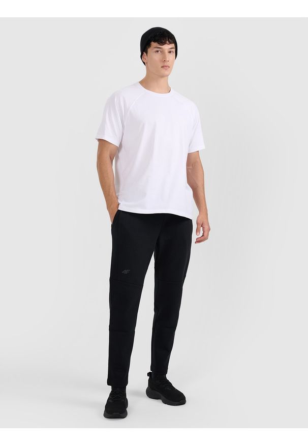 4f - 4F Spodnie dresowe męskie - czarne S. Kolor: czarny. Materiał: dresówka