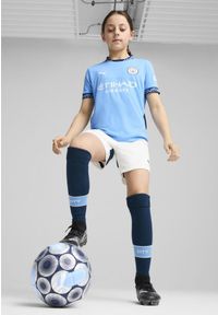Puma - Młodzieżowa koszulka domowa Manchester City 24/25 PUMA Team Light Blue Marine. Kolor: niebieski