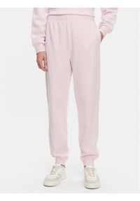TOMMY HILFIGER - Tommy Hilfiger Spodnie dresowe WW0WW45576 Różowy Regular Fit. Kolor: różowy. Materiał: bawełna #1