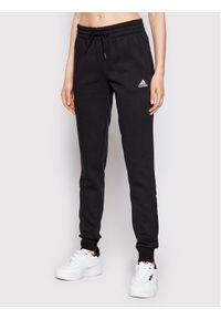 Adidas - adidas Spodnie dresowe Essentials Fleece GM5547 Czarny Regular Fit. Kolor: czarny. Materiał: bawełna, syntetyk #1