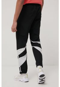 adidas Originals spodnie H06758 męskie kolor czarny joggery. Kolor: czarny. Materiał: tkanina, poliester, materiał #3