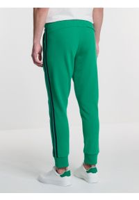 Big-Star - Spodnie męskie dresowe z lampasami zielone Smith 301/ Santo 301. Kolor: zielony. Materiał: dresówka. Wzór: nadruk #7