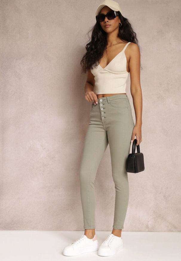 Renee - Ciemnozielone Spodnie Skinny Winvienne. Stan: podwyższony. Kolor: zielony. Długość: długie. Wzór: ażurowy