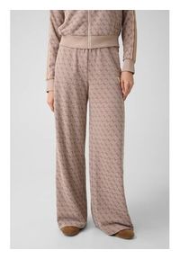 Guess Spodnie materiałowe 183095 Beżowy Slim Fit. Kolor: beżowy. Materiał: materiał #2