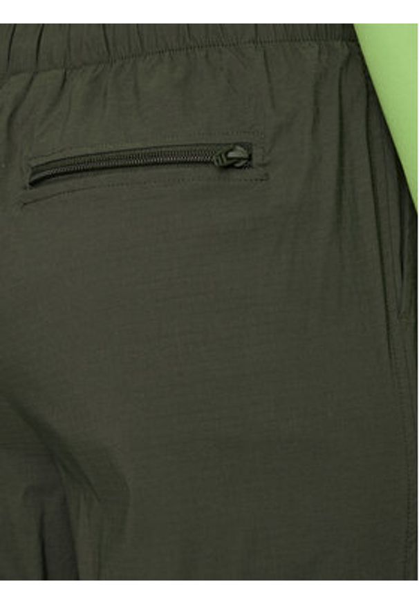 Rains Spodnie materiałowe Tomar Pants Regular 19300 Zielony Regular Fit. Kolor: zielony. Materiał: syntetyk