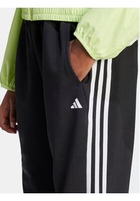 Adidas - adidas Spodnie dresowe Train Essentials HZ5646 Czarny Loose Fit. Kolor: czarny. Materiał: syntetyk #4
