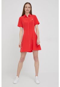 Calvin Klein Jeans sukienka kolor czerwony mini rozkloszowana. Kolor: czerwony. Materiał: tkanina. Długość rękawa: krótki rękaw. Typ sukienki: rozkloszowane. Długość: mini #4
