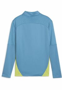 Puma - Młodzieżowa bluza treningowa Manchester City F.C. z zamkiem 1/4 PUMA. Kolor: żółty, wielokolorowy, niebieski