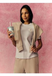 4f - 4F T-shirt relaxed z nadrukiem damski - niebieski XS. Okazja: na co dzień. Kolor: niebieski. Materiał: materiał, bawełna, skóra, dzianina. Wzór: nadruk. Styl: casual #1