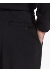 Moose Knuckles Spodnie dresowe Montrose M32MR767H Czarny Regular Fit. Kolor: czarny. Materiał: bawełna