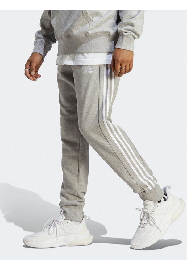 Adidas - adidas Spodnie dresowe Essentials French Terry Tapered Cuff 3-Stripes Joggers IC9407 Szary Regular Fit. Kolor: szary. Materiał: bawełna