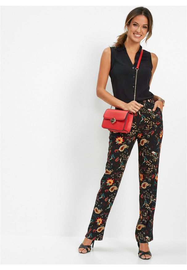bonprix - Spodnie z wiskozy z gumką w talii. Kolor: czarny. Materiał: wiskoza. Wzór: nadruk, kwiaty