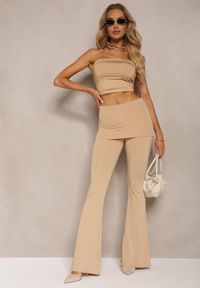 Renee - Beżowe Elastyczne Spodnie o Kroju Dzwonów High Waist z Modelującego Materiału Ivolea. Stan: podwyższony. Kolor: beżowy. Materiał: materiał