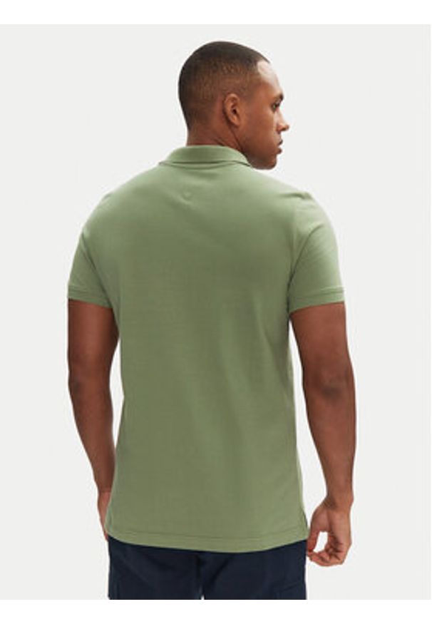 Tommy Jeans Polo DM0DM20676 Zielony Slim Fit. Typ kołnierza: polo. Kolor: zielony. Materiał: bawełna